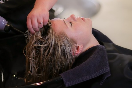 Staff washing women hair